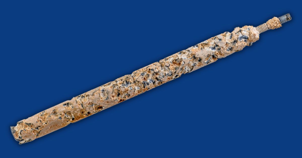 Anode rod on blue background