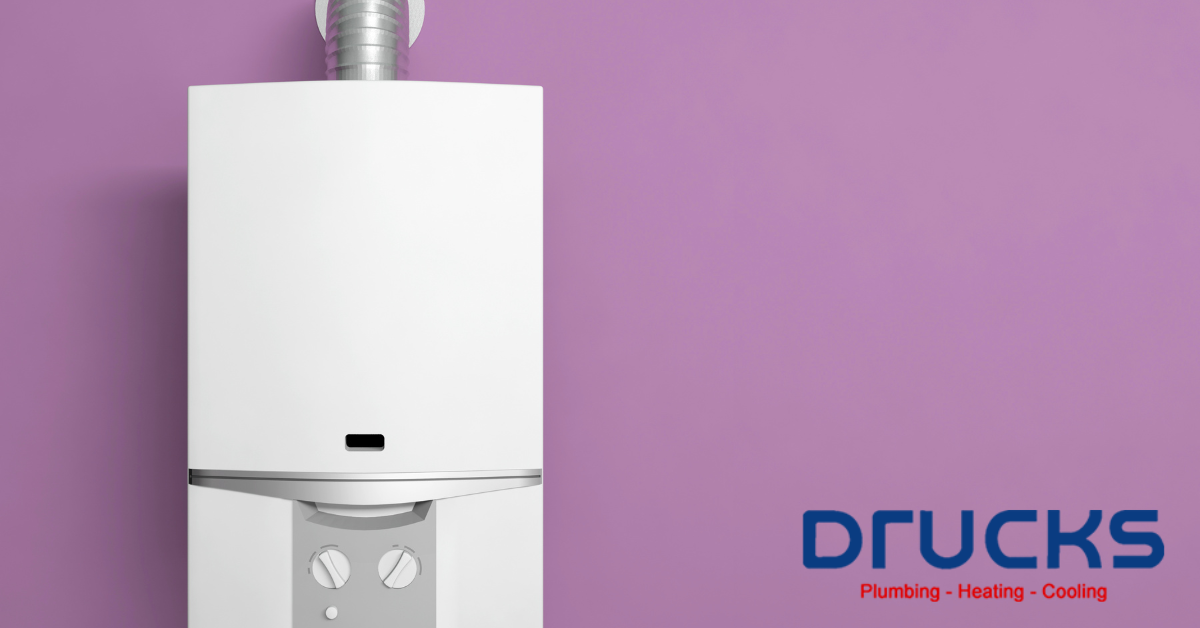 Tankless water heater against purple background